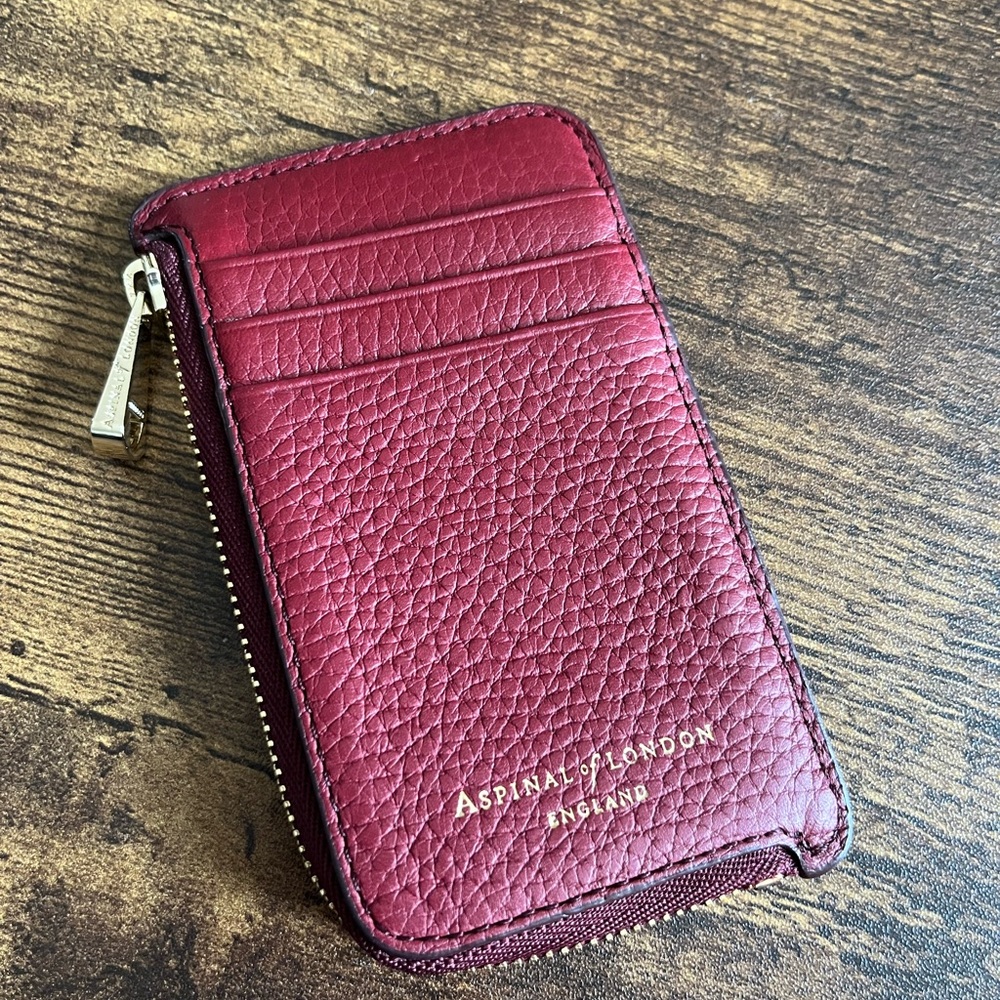 Aspinal of London Zipped Coin and Card Holder in Bordeaux pebble.